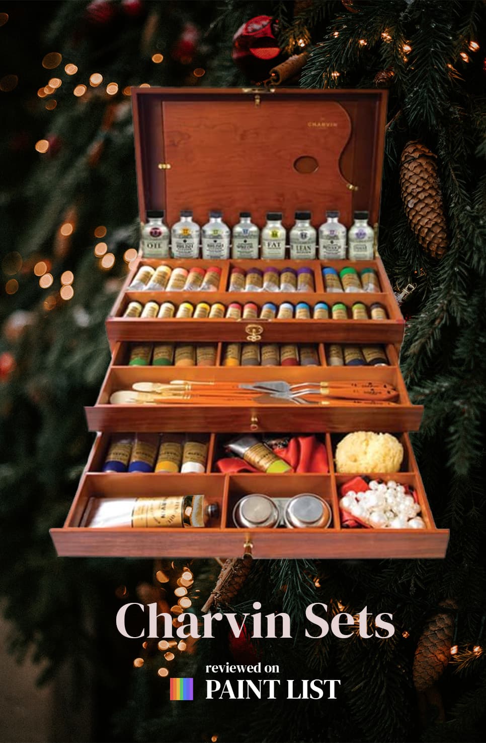 This is a paint set with a variety of paint tubes, brushes, palette knifes, a sponge, and even a pile of pearls.