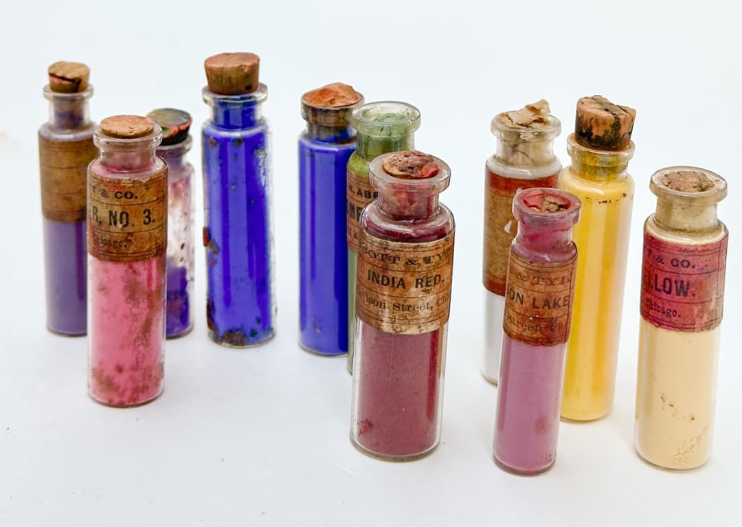 A handful of antique pigments in vials