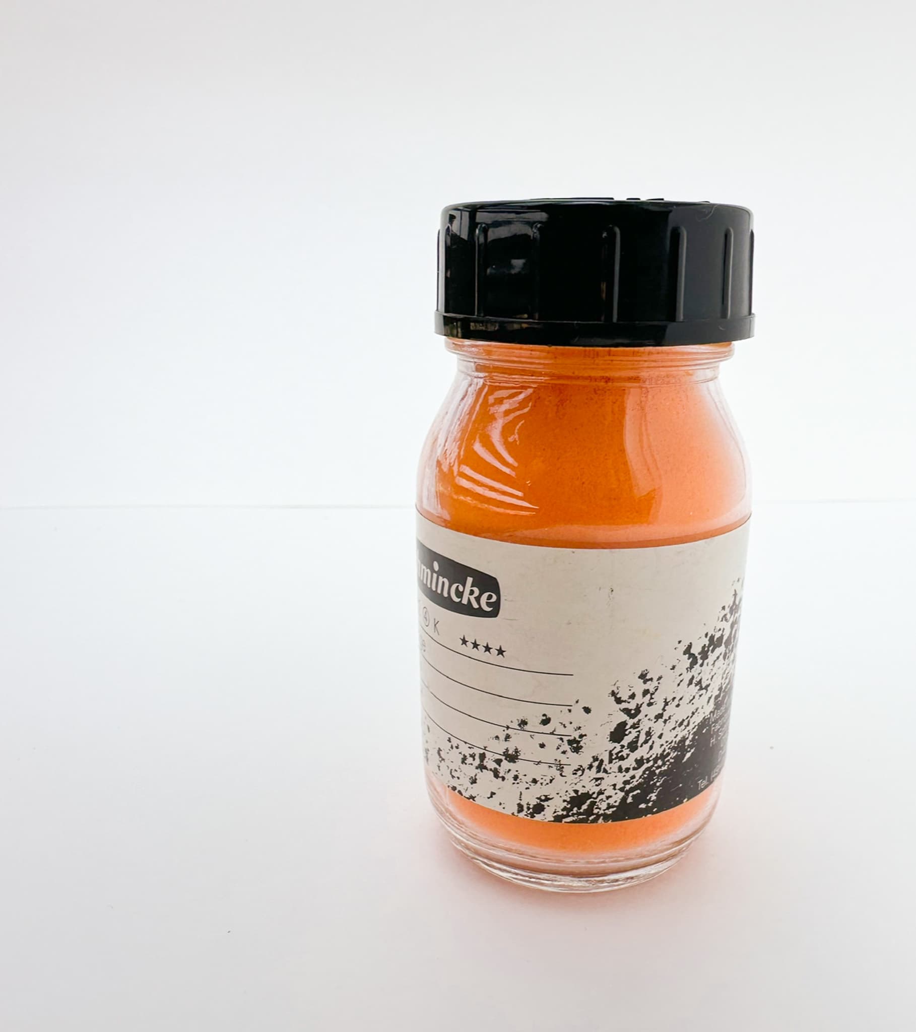 A bottle of orange pigment from Schmincke