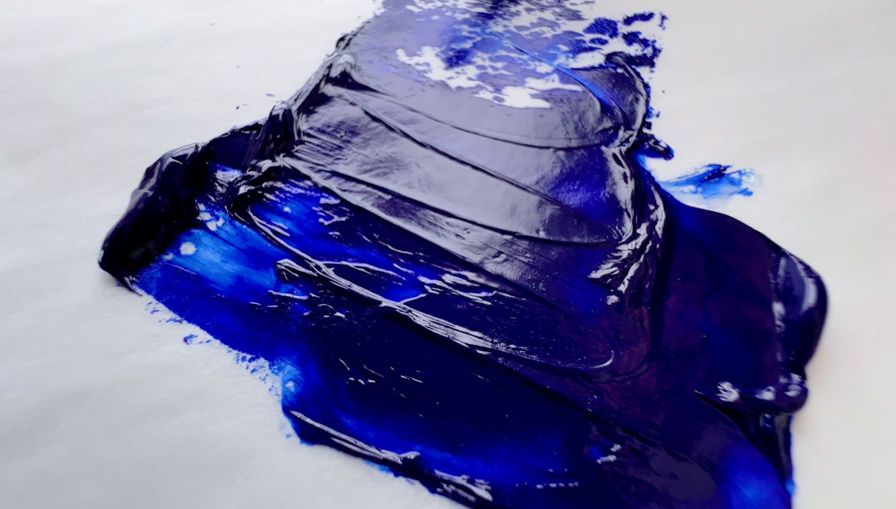 A swirl of ultramarine showing the buttery quality of Blockx oil paint