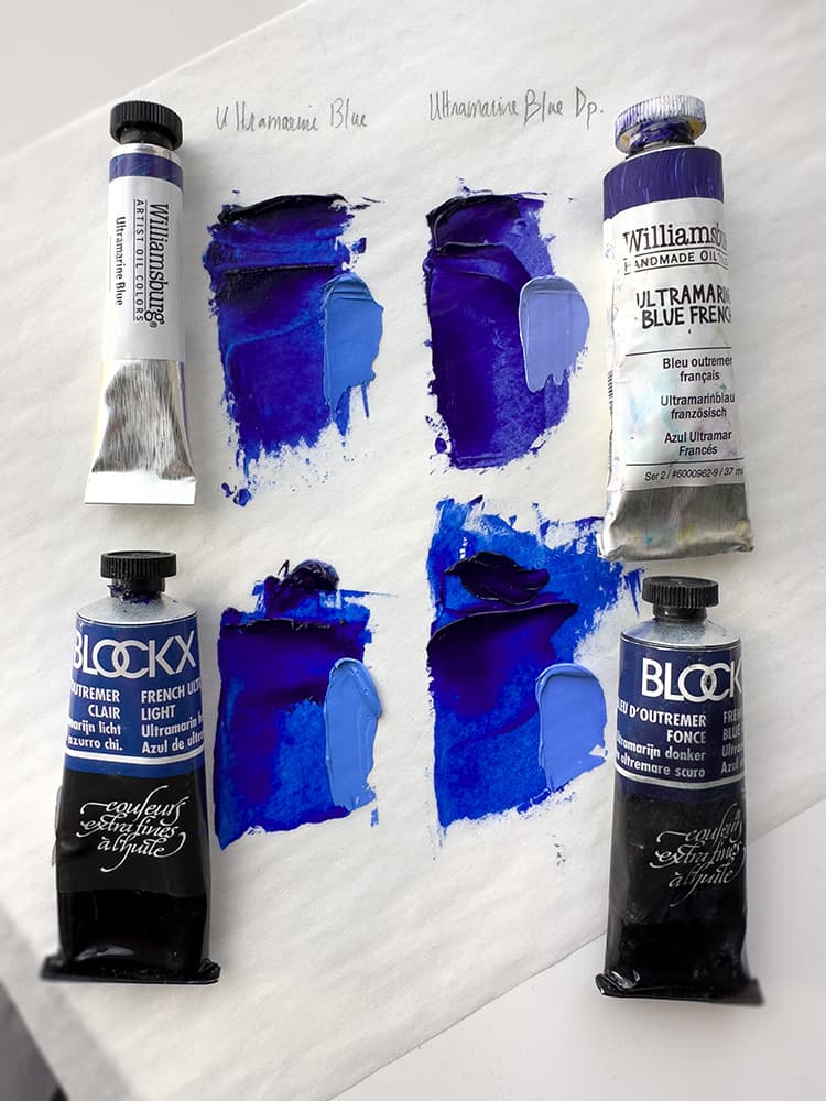 Four tubes of oil paint showing a swatch as well as a tint. The Williamsburg French Ultramarine Blue is more purple/indigo than their regular ultramarine. With Blockx it is harder to distinguish the difference between ultramarine regular and ultramarine deep