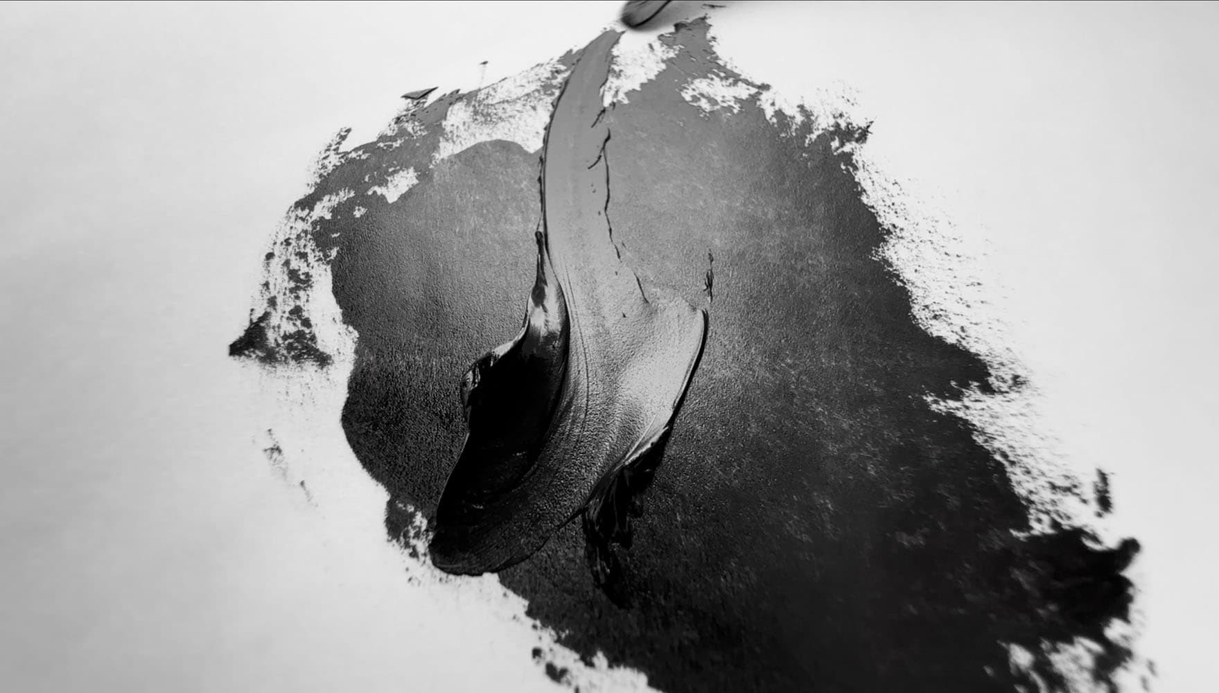 A swoosh-mark of Old Holland black oil paint