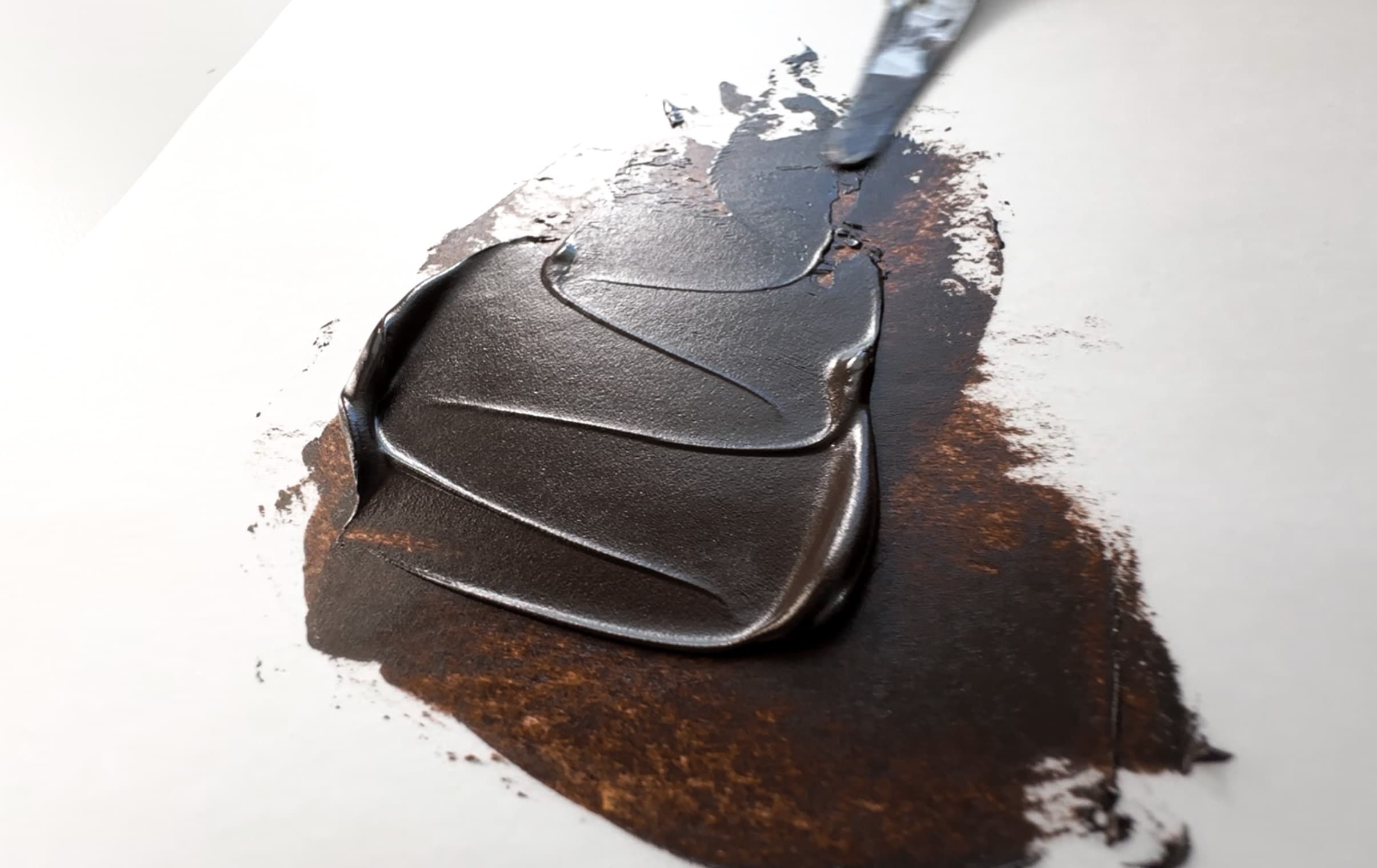 A swatch of brown oil paint made from Brown Iron Oxide