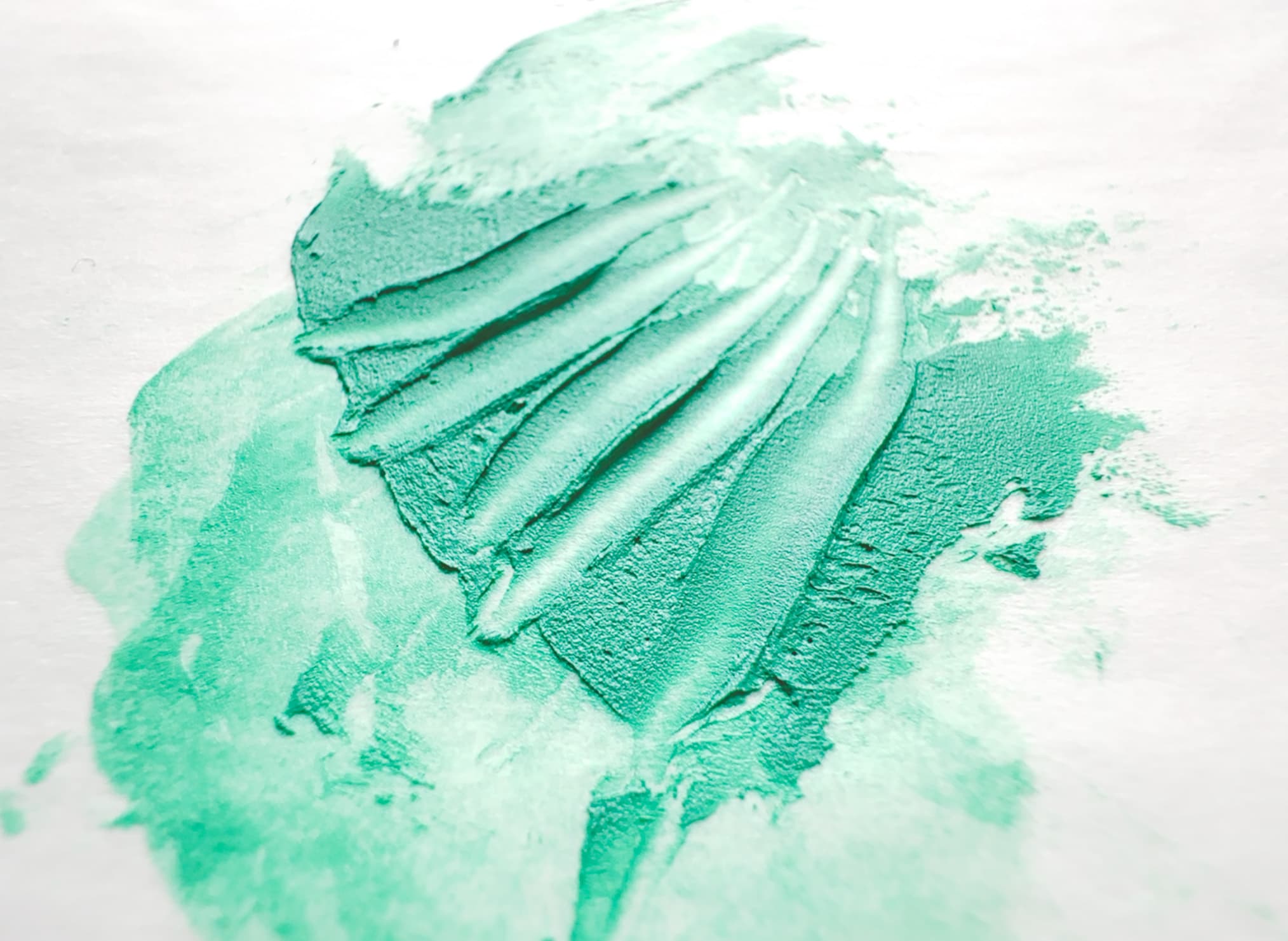 A dimensional swatch of oil paint with troughs carved by a palette knife