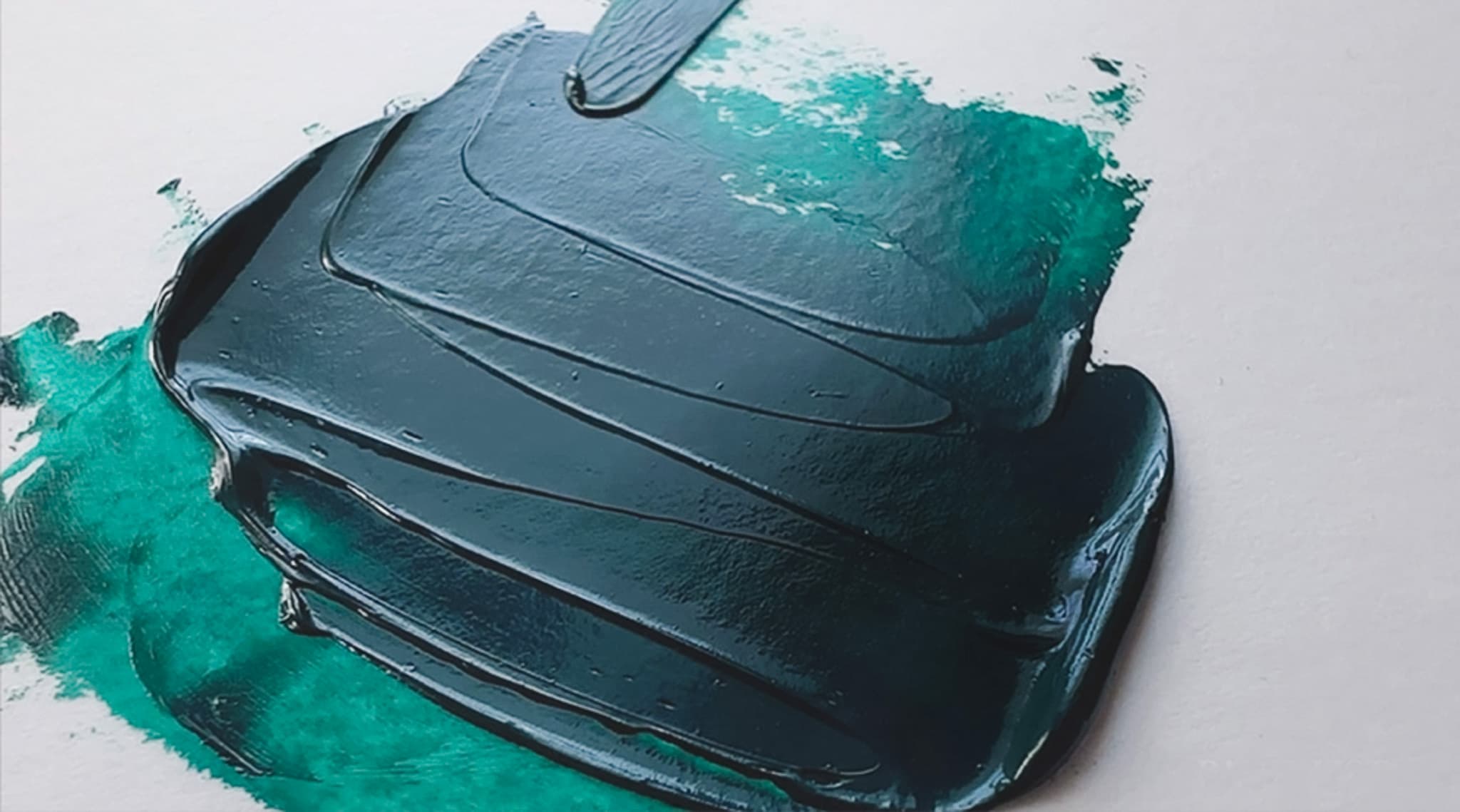 An dollop of green oil paint made with Phthalo Green Blue Shade