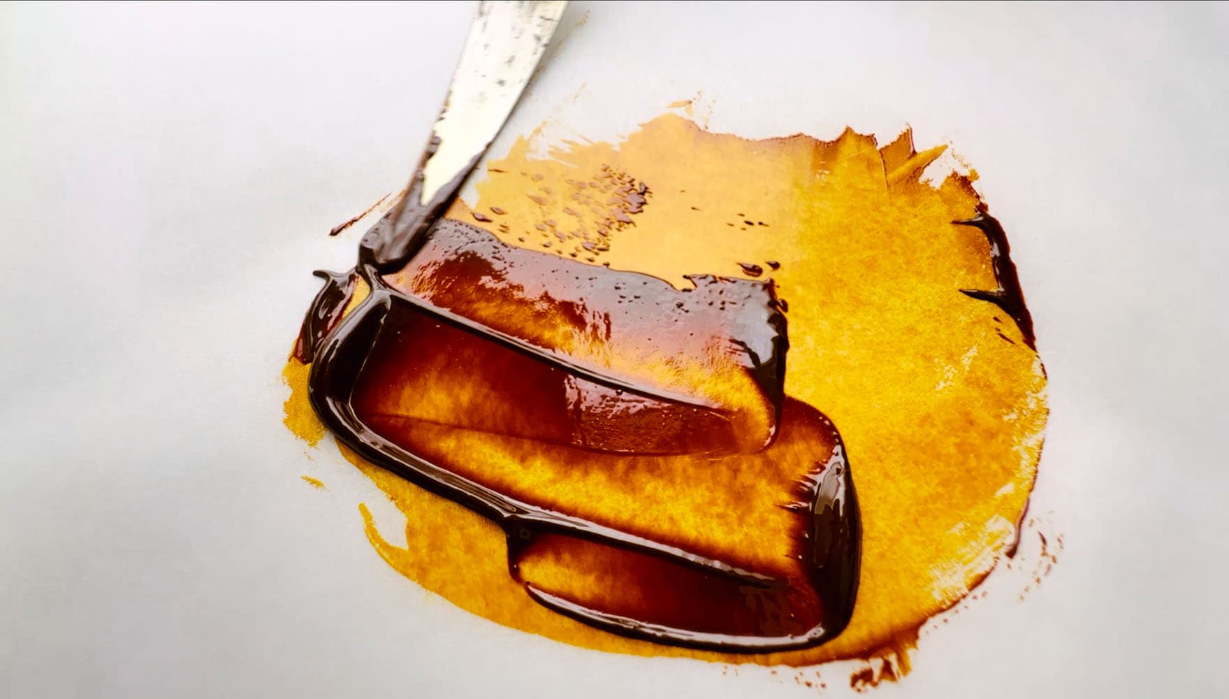 A dollop of genuine quinacridone gold oil paint. Very deep in masstone and a vibrant gold when thinned