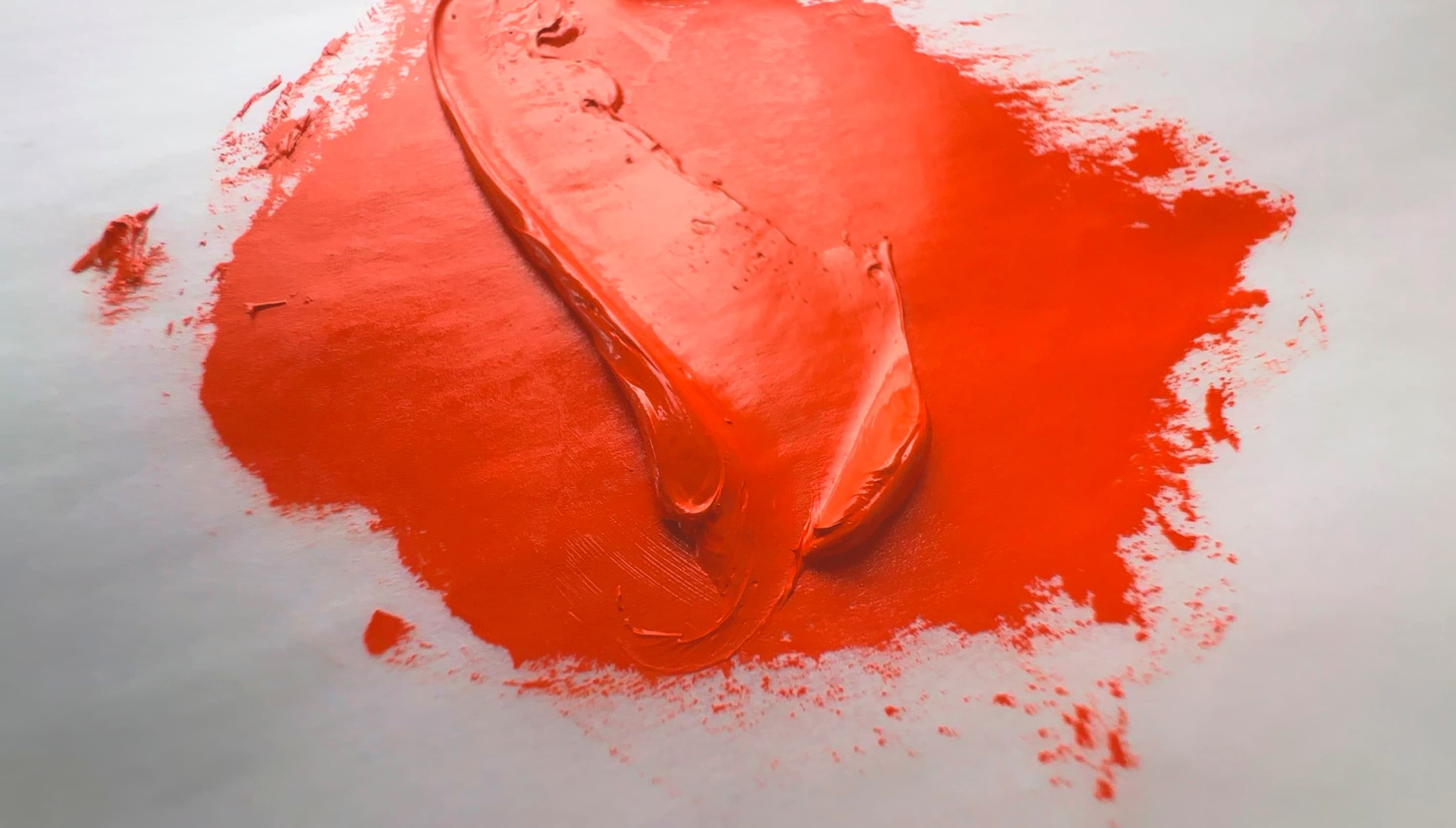 An impasto stroke of Molybdate Orange, made with PR104