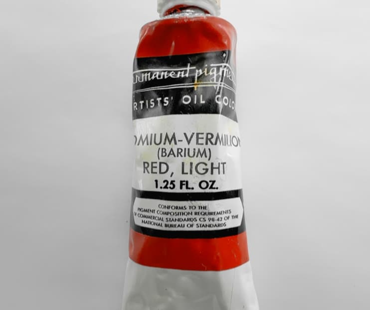 A vintage tube of Mercadmium Red oil paint by Permanent Pigments