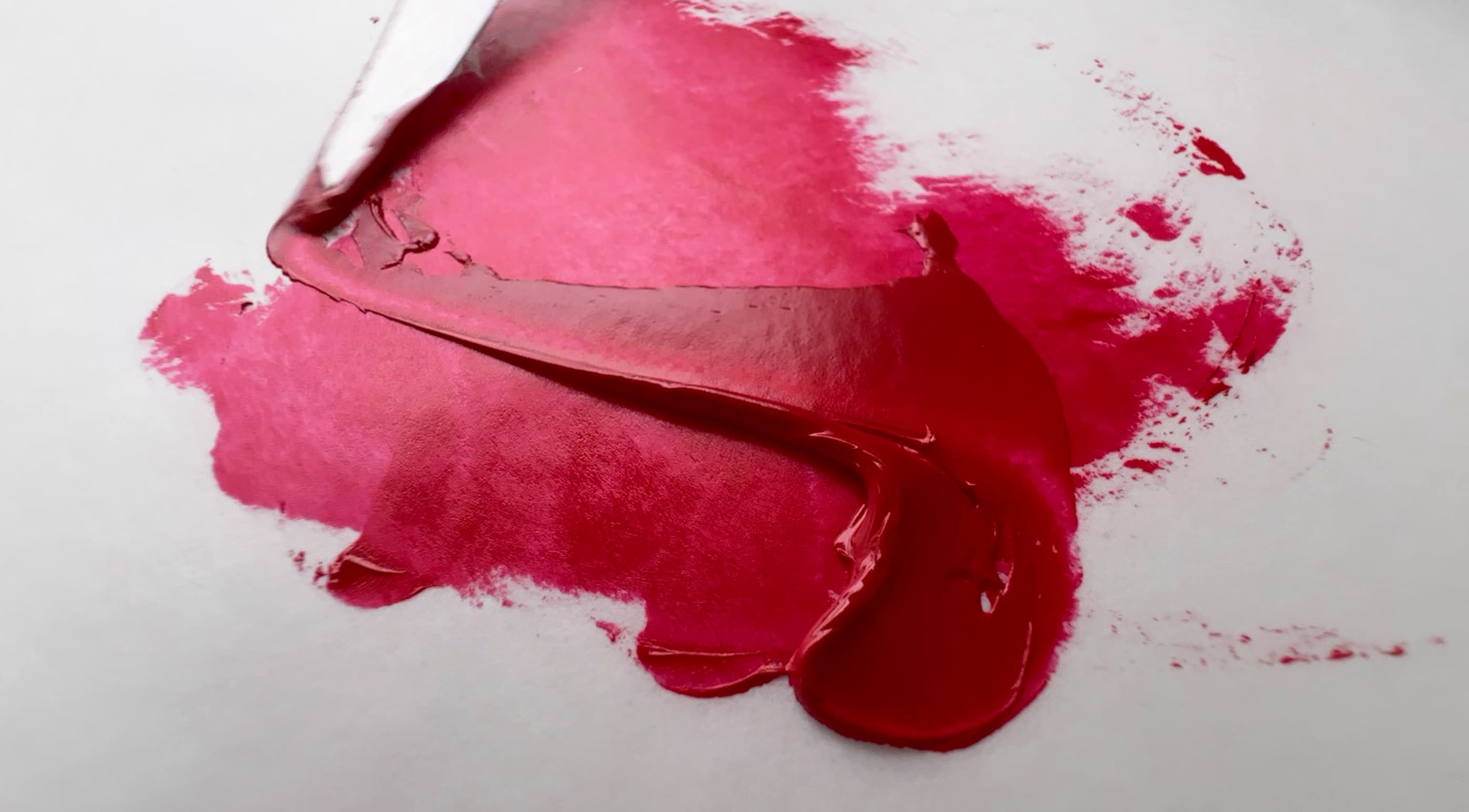 A magenta swoosh of PR149 in oil paint