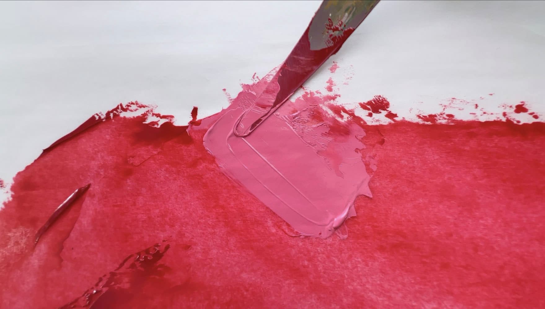 Red oil paint mixed with white to make a bright pink
