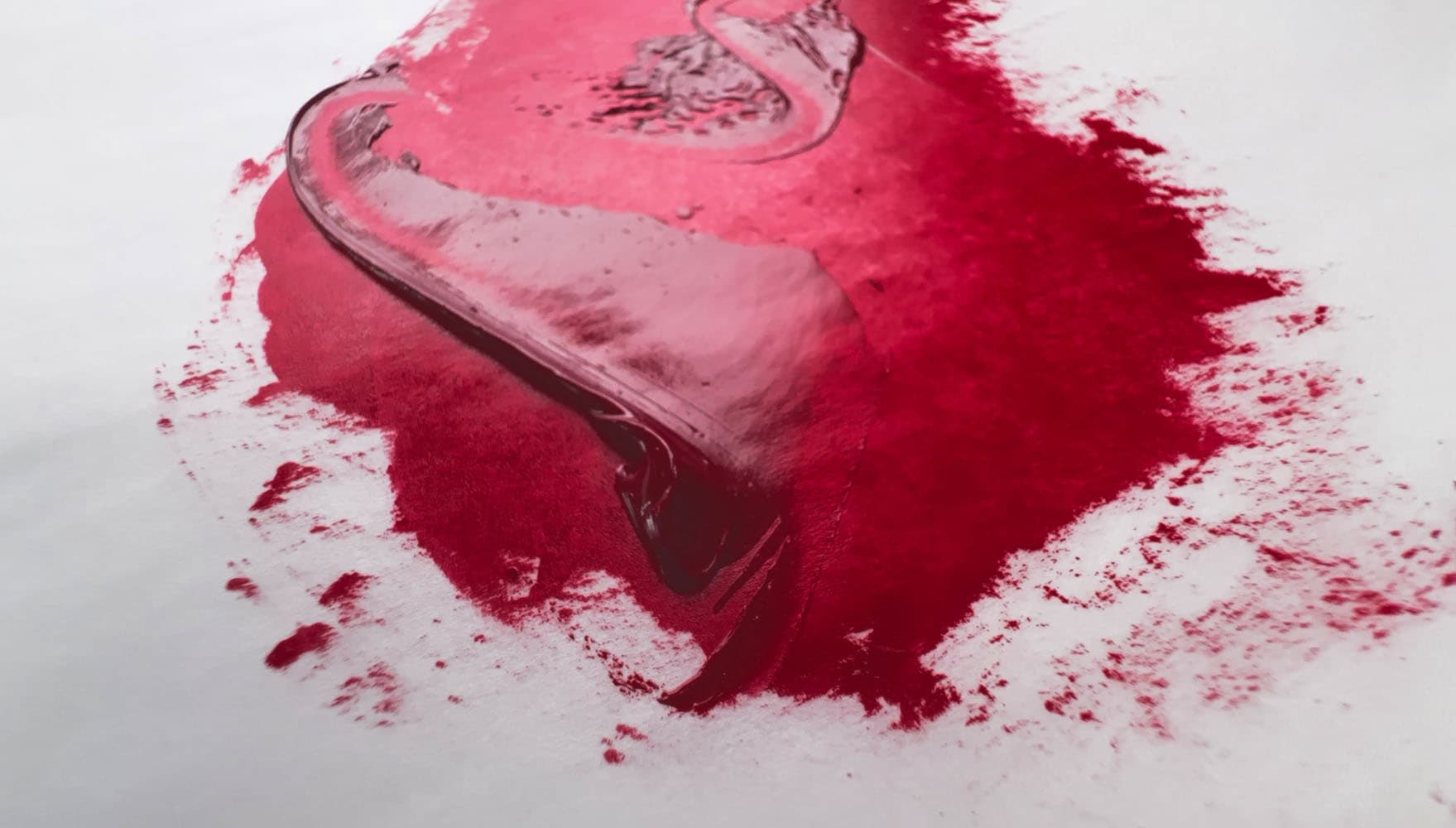 Red oil paint with transparency