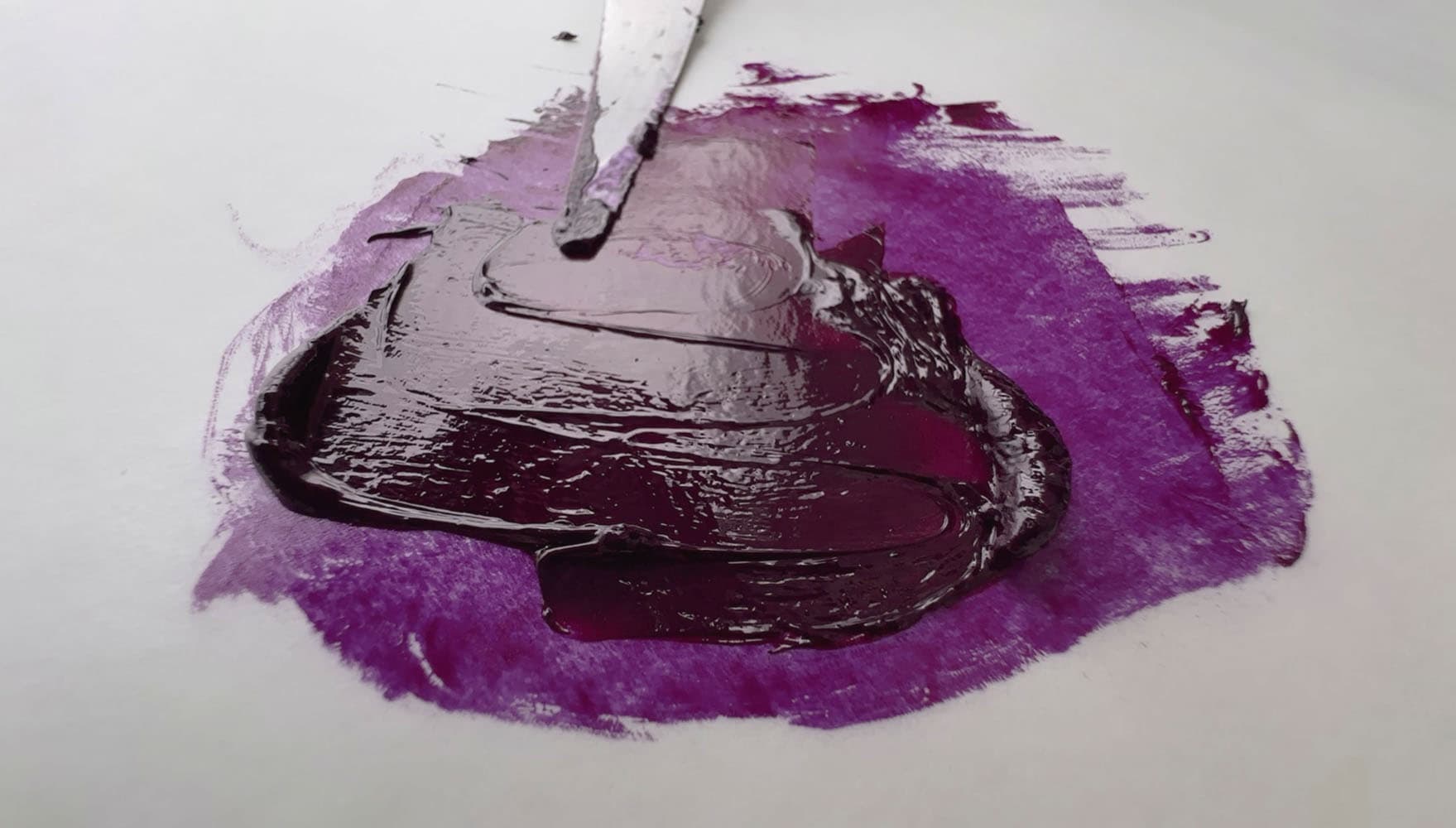 A swirl of purple oil paint by Daniel Smith