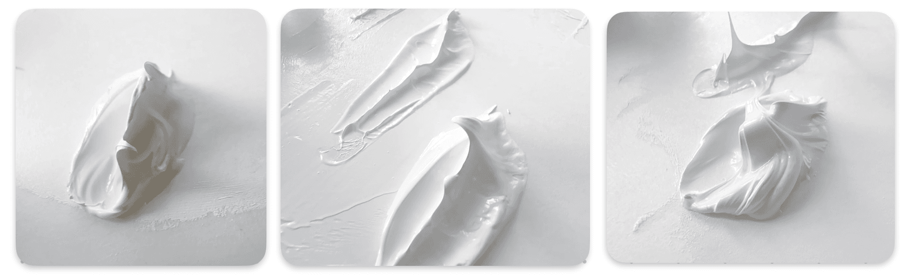 Daubs of Gamblin's three Titanium White oil paints, all made with PW6. The regular Titanium White has stiff peaks with pointy ribbons, the Radiant White falls a bit with rounded edges, and the Flake White Replacement Hue has fallen, stringy peaks with ropey ridges