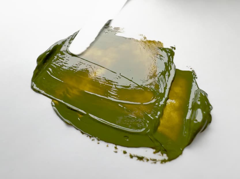 A swoosh of Vasari oil paint. PY129 has a transparency to it that tends to be a warm yellow-green