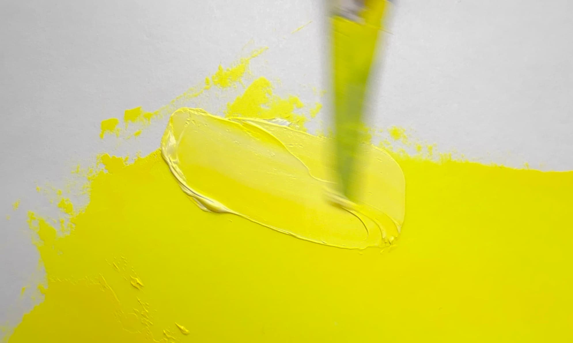 A dollop of oil paint made with Hansa Yellow PY3