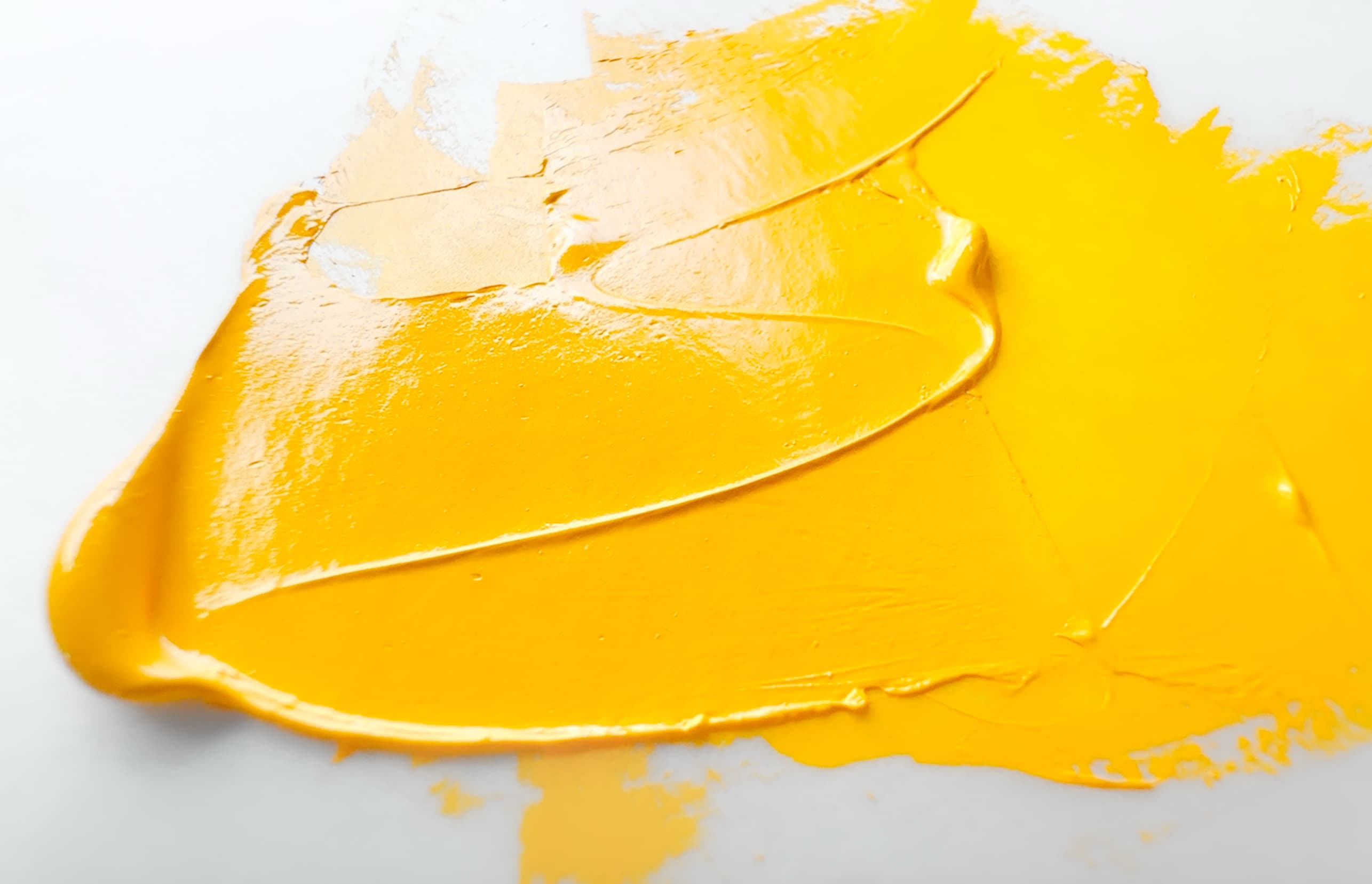 A swoosh of yellow oil paint