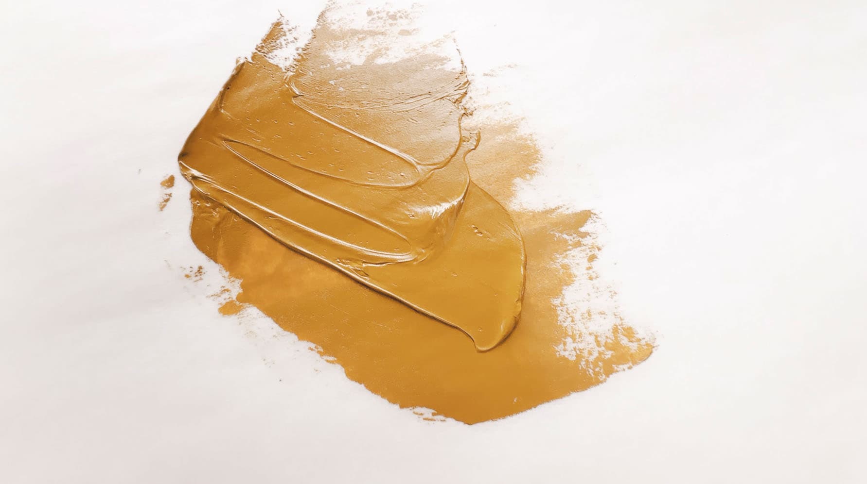 An opaque yellow-brown oil paint