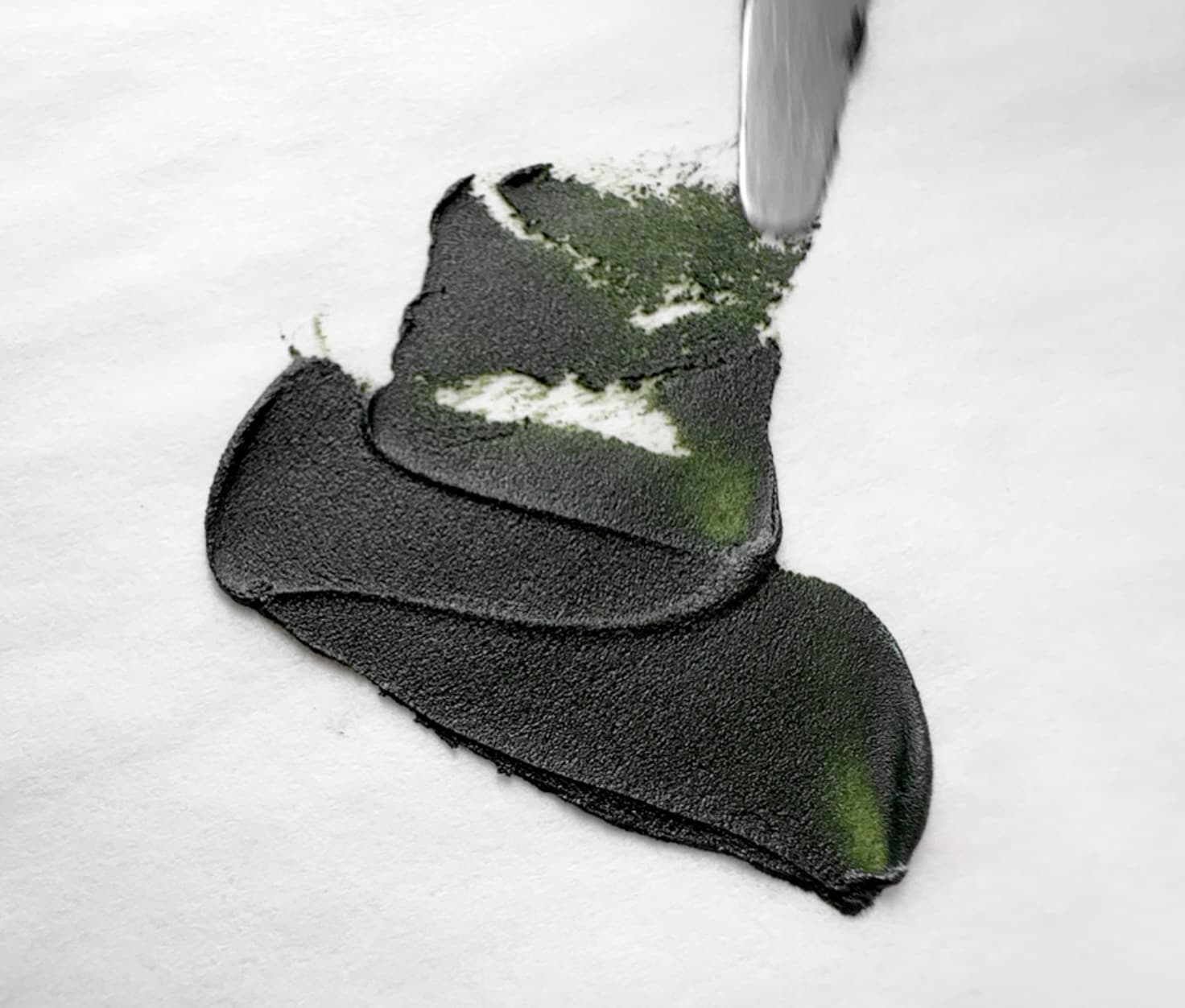 A swoosh of green oil paint made with Volkonskoite